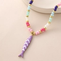 Perlenkette im Boho-Stil mit goldenen Trennelementen und lila Fisch-Anhänger - Lila Gestreift (NAL04-8) / Perlenkette / Violetter Fisch (NAL04-8)