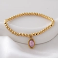 Gold beaded bracelet featuring a smooth pink natural stone pendant for women - Pink(NAI09-10)