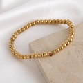 Bracelet en perles dorées d'acier inoxydable avec un zircon rouge foncé de naissance - Juillet
