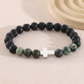 Cross charm bracelet with black lava stone and green marble beads on sandy background - 8mm Stainless Steel Cross (20cm) / Lava Stone & African Turquoise (NAM04-3)