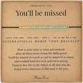 Handmade morse code bracelet with turquoise and gold beads on a message card - Missed Style