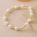 Baroque pearl bracelet with gold-plated copper beads on a textured stone stand - Gold (3+6mm-NAM10-5)