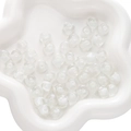 Polka dot glass beads in a white ceramic tray for DIY jewelry making and crafts - 1 Piece/Pack (Approx 12x8mm) / White