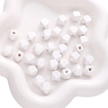 White octagonal wooden beads for DIY jewelry making displayed in a ceramic bowl - 10mm 10 Pieces/Pack / Pearl White