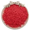Vibrant red opaque glass seed beads for DIY jewelry making in a decorative metal bowl - Red