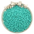Tiffany blue glass seed beads in a silver bowl for DIY jewelry and necklace crafts - Turquoise Green
