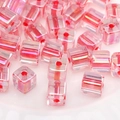Iridescent pink cubic glass beads for DIY jewelry making showing rainbow reflection - Light Pink AB Coating Cube Beads (#14)