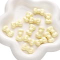 Perline a fiocco in acrilico beige perlato con finitura iridescente per gioielli DIY - Fiocco a Bordo Arrotondato / Confezione da 5 (26x15mm) / Giallo