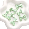 Perle in resina a forma di fiocco verde pastello cangiante per gioielli fai da te e bracciali - Fiocco di Nastro / Confezione da 5 (32x24mm) / Verde