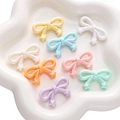 Perline a fiocco in acrilico pastello con stelle e finitura AB per gioielli fai-da-te - Fiocco Stella / Confezione da 10 (34x20mm) / Colori Misti Casuali