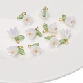 Iridescent white acrylic lily of the valley charms with green leaves and gold rings - AB White