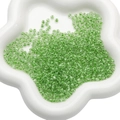 Light green 4mm glass seed beads for DIY jewelry making displayed in a white ceramic dish - 4mm / 10g/Pack (Approx. 160 pcs) / Green