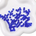Deep blue frosted square glass beads for DIY jewelry making in a white ceramic dish - 11g/Pack (Approx. 50 Pcs, 5x5mm) / Sapphire Blue