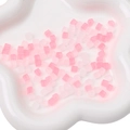 Matte pink cube glass beads for DIY jewelry making displayed in a white ceramic tray - 11g/Pack (Approx. 50 Pcs, 5x5mm) / Pink Mix
