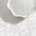Aurora white iridescent 2-4mm glass seed beads for DIY jewelry making in a wave bowl - 2mm 15g Pack Approx 1000 Count / White