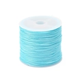 0.7mm sky blue crystal elastic cord for DIY bracelets on a translucent white spool - Lake Blue Flat Elastic Thread