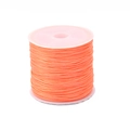 DIY jewelry 0.7mm orange crystal elastic cord wound on a white plastic spool - Apricot Flat Elastic Thread