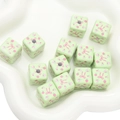 Light green acrylic cube beads with floral and pink bow patterns for DIY phone chains - Green Floral Bow