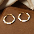 Modern white enamel and gold plated titanium hoop earrings with geometric wave design - White