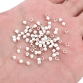 Polished silver square spacer beads for DIY jewelry making held in a palm - Square Faceted Style (FGT395) / 10 Pieces/Pack (2.5x2.5mm) / Silver