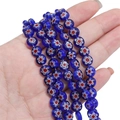 Flat round Millefiori glass flower beads in deep blue for DIY jewelry making - Sapphire Blue