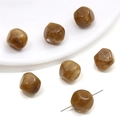 Macro shot of amber style acrylic beads with marble texture and drilled holes for jewelry - Irregular Faceted Beads / 5 Pieces/Pack (12x12mm) / Brown