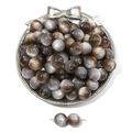 Deep grey and amber resin cat-eye round beads in a vintage silver bow jewelry dish - Coffee Gray