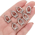 Silver horseshoe charms with sparkling crystals for DIY jewelry making, set of seven pieces - Hollow Bowknot Pendant / 1 Piece
