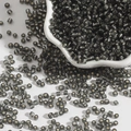 Metallic silver-black glass seed beads for DIY jewelry in a ceramic dish - Dark Gray