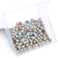 Polished blue and brown speckled natural stone beads in a clear storage box - 10Pcs/Pack / Shoushan Stone / 4mm