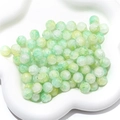 Makroaufnahme von Crackglas-Perlen in Hellgrün und Gelb für DIY-Schmuckherstellung - 10mm (Loch ca. 1mm, 20 Stk./Packung) / Farbe 1 (Hellgrün & Gelb)