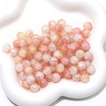 Macro detail of crackle glass beads in pink and orange gradients for DIY jewelry making - 10mm (Hole Approx 1mm, 20 Pcs/Pack) / Color 16 (Pink Orange White Gradient)