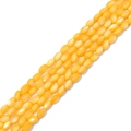 Stränge aus ovalen ingwergelben Muschelperlen für DIY-Schmuck und Bastelarbeiten - 3x5mm (37cm/Strang) / Gelb