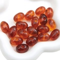 Perle ovali in acrilico ambrato tartarugato per la creazione di gioielli e bracciali - 21x14mm / 5 Pezzi/Confezione Perla Ovale Piatta (BSD713) / Ambra