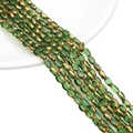Green ribbed oval glass beads with gold spacer beads for DIY jewelry making sets - 4x6MM / Transparent Green