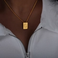 Elegant gold square pendant necklace with engraved letter C worn by a model - Letter C Style (P1506-C)