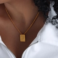 Polished gold rectangular pendant necklace featuring embossed letter G on a fine chain - Letter G Style (P1506-G)