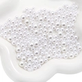 Mix of white glossy ABS artificial pearls in various sizes for DIY jewelry crafts - 3-8mm (10g/Pack) / Pure White