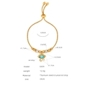 Goldenes Titanstahl-Schlangenarmband mit blauem Evil-Eye-Anhänger und feinen Kristallen - E439 Modellstil (E439 Goldarmband)
