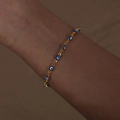 Golden chain bracelet featuring blue enamel evil eye charms for a stylish retro look - Blue Style (E459)