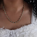 Elegant 18k gold plated titanium necklace with green evil eye charms on female model - Green Style (P1528)