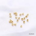 Detail showing 3.2mm 14K gold-plated crimp beads for DIY jewelry bracelet making - Crimp Bead / 3.2mm (1 Piece) / 14K Gold