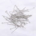 Close-up of bright silver eye pins for DIY jewelry making and handmade crafts - 0.7x20mm (50 Pieces/Pack) / Platinum Plated