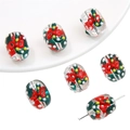 Detailed view of Christmas themed glass snowman beads with red bows for DIY jewelry - Candy Cane