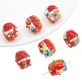 Detailed view of handmade glass snowman beads for Christmas DIY jewelry making - Christmas Hat (1.5mm Hole)