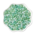Light green cat-eye glass round beads for DIY handmade jewelry crafts in a white bowl - 4mm 10g/Bag / Vibrant Greenery