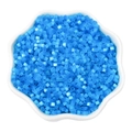 Vibrant blue 2.5mm cat-eye seed beads for DIY jewelry displayed in a white petal bowl - 2.5mm (10g/Pack) / Indigo Blue