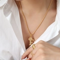 Golden necklace featuring a crown-topped letter F pendant with a sparkling zircon rope chain - Letter F / Gold