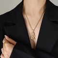 Golden R letter pendant with crown and zircon stones on a gold twisted chain necklace - Letter R / Gold