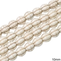 10mm white synthetic turquoise oval beads with brown marble texture and carved grooves - Pumpkin Bead Shape / 10mm (Approx 40 Beads) / Marbled White